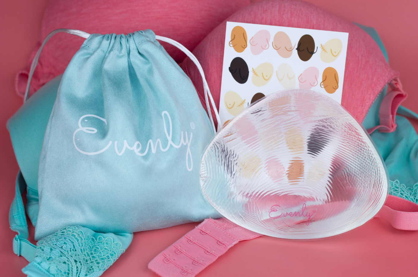 Clear silicone bra with pink straps, turquoise drawstring bag labeled 'Evenly', and color swatch on a pink background for  Non Surgery Fix for Uneven Boobs