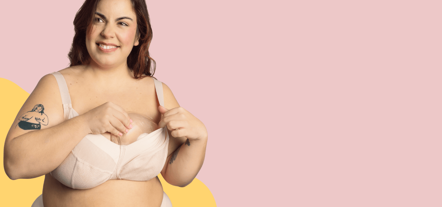 Model with bra insert on pink and yellow background